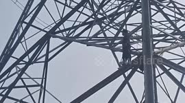Distressed man rescued from electricity pylon in India