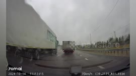 Russia: Moment Lorry Driver Narrowly Escapes Death As He Smashes Into Back Of Truck Full Of Sand Stopped On Motorway