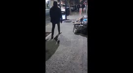 Person watching TV on the streets of Buenos Aires