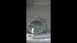Helpful Robot Vacuum Cleans Car Trunk