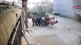 Elderly men helpless as tractor spins out of control before slamming into wall in China