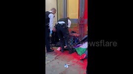 UK: Protesters throw paint on and block the front and rear entrances to APCO's London office