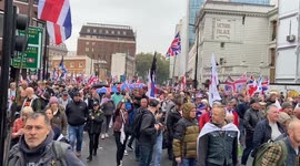 Thousands of far-right protesters march in solidarity with Tommy Robinson and against immigration in London