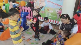 Kindergarten kids having fun at Halloween party