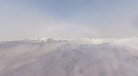 Ice breaker ship slices satisfying through frozen sea