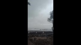 Tropical Storm TraMi makes landfall in central Vietnam causing high waves and strong winds