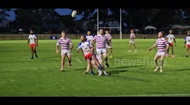 Rugby Player dislocates ankle during tackle. His partner comes on to comfort him.