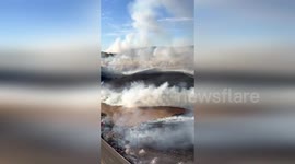 US: Dramatic Video Shows Intense Aerial Assault on 64-Acre Wildfire in California