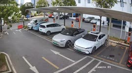 Tesla reverses and crashes into charging station