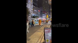 China: Strong Wind Almost Blow a Inflatable Costume Guy Away