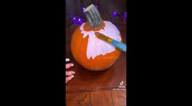 Easy Painting tutorial of Kirby on a pumpkin with acrylic paint.