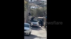 Israel: Israeli police attempt to climb electricity poles to remove the Palestinian flag in the town of Issawiya in Jerusalem