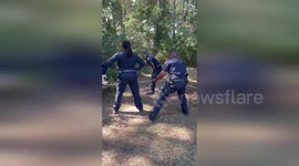 US: Massive 800-Pound Pig Outsmarts Police in Hilarious Tug-of-War Rescue