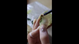Artisan crafts lifelike clay rose in China
