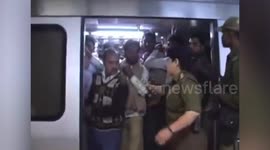 Indian police slap men caught riding in women's train coach