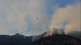 Helicopters tackle wildfire flames in Turkey