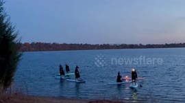 Witches paddle on Lake Harriet