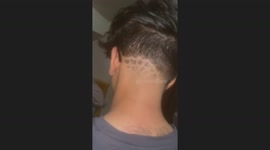 Person flinches as alcohol is sprayed on head in Birmingham