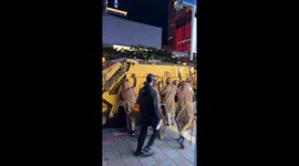 Halloween revellers dress as a swarm of cockroaches