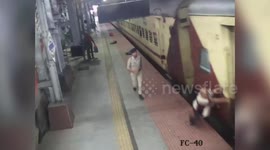 Railway officer saves man from falling under moving train