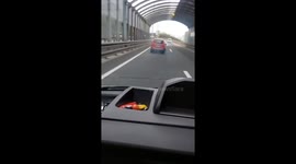 Motorist Drives Down Highway on a Broken Wheel