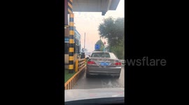 BMW's tyre falls off after motorist exits highway in China