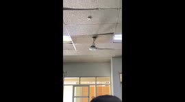 One-blade fan spins unsteadily in public school in Mendoza