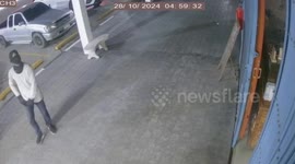 Hero shopkeeper fights off robber trying to steal her bag
