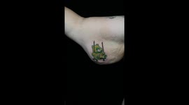 Swinging Care Bear Tattoo