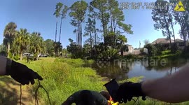 Police deputy jumps into canal to save dog and reunites pup with owner