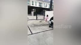 Toddler falls into hole in their home's driveway