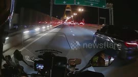 Quick-thinking policeman stops woman trying to jump off bridge