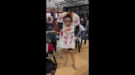 Kid wears creepy headless ghost costume to Halloween party