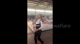 Woman's robot-like movements leave shoppers baffled in China