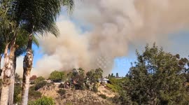 US: Wildfire Breaks Out Near College Area In San Diego, California