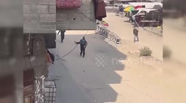 Palestine: Civilians Transport the Injured Following Israeli Drone Bombings Near Gaza Market