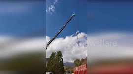 Floating platform built on lake to clear debris in Hurricane Helene aftermath