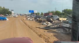 Spain floods aftermath has wrecked cars piled up from being washed away