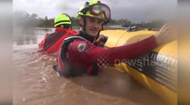Firemen save couple and pet dogs from DANA floods in Valencia, Spain