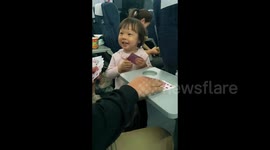 China: Play Cards with a Child on the Train