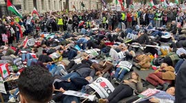 Pro-Palestine protesters stage a mass ‘die-in’ outside Downing St in London