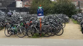 Thousands of bicycles are parked outside Gent St Pieters train station in Belgium