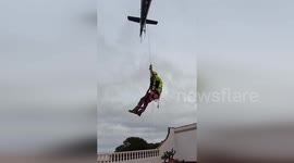Helicopter team save 19 stranded residents from Spain floods