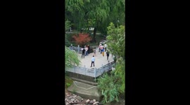 Video shows people fleeing overflowing river in Zhejiang, China