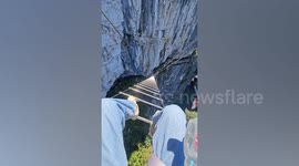 China unveils 5,000ft high climbing ladder over looking cliffs