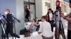 Religious fanatic attacks celebrity lawyer during live press conference in Bangkok