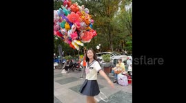 China: A Kind Balloon Seller