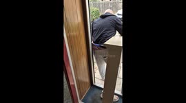 Man Trapped By Doorway Wedgie