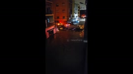 Massive Flooding in Spain Carries Cars Away