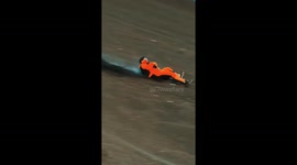 Daredevils reach speeds up to 101km/h while surfing down volcano